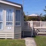 A caravan with decking