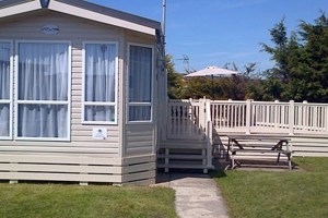 A caravan with decking